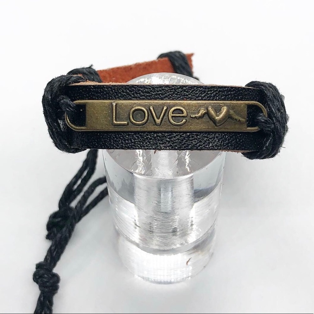 Black leather bracelet.